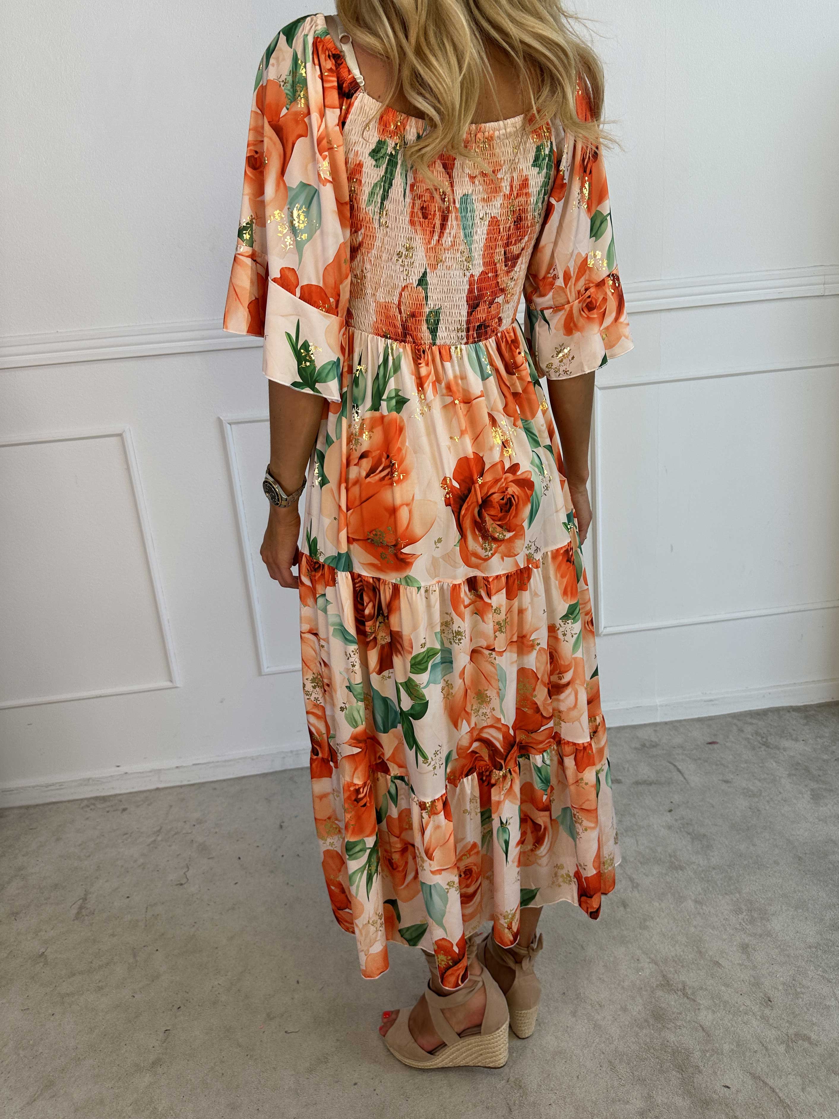 Elna Flower - Blomstret elastisk kjole med smock over brystet